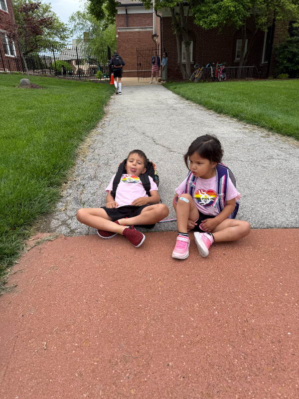 Ororo and Logan outside of their school